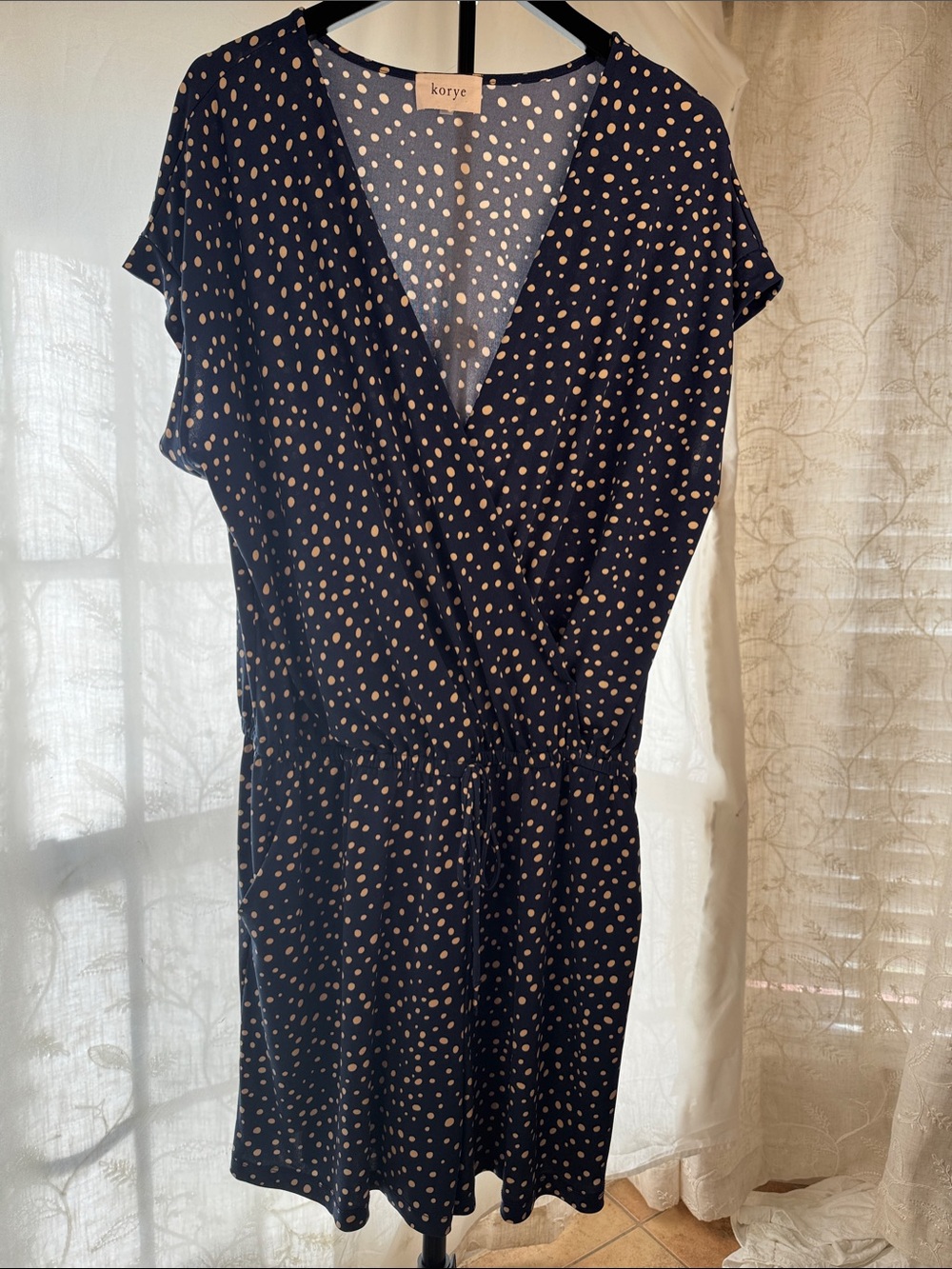 Korye Navy Polka Dot Wrap Romper